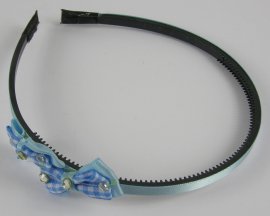 Diadeem strikjes en steen blauw.