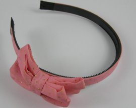 Diadeem met dubbele strik roze.