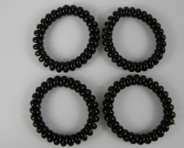 4 rubberen haarelastieken zwart.
