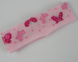 Haarband met vlinder licht roze.