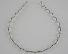 Diadeem zilverkleur ribbel.