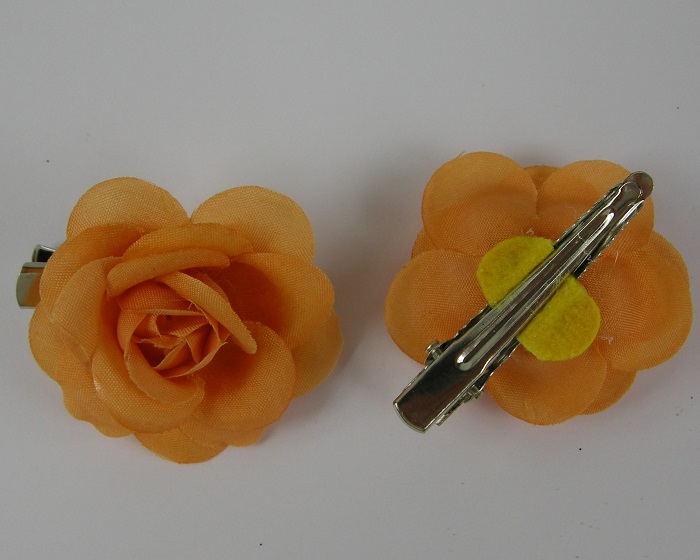 (image for) 2 duckklemmen met roos oranje.