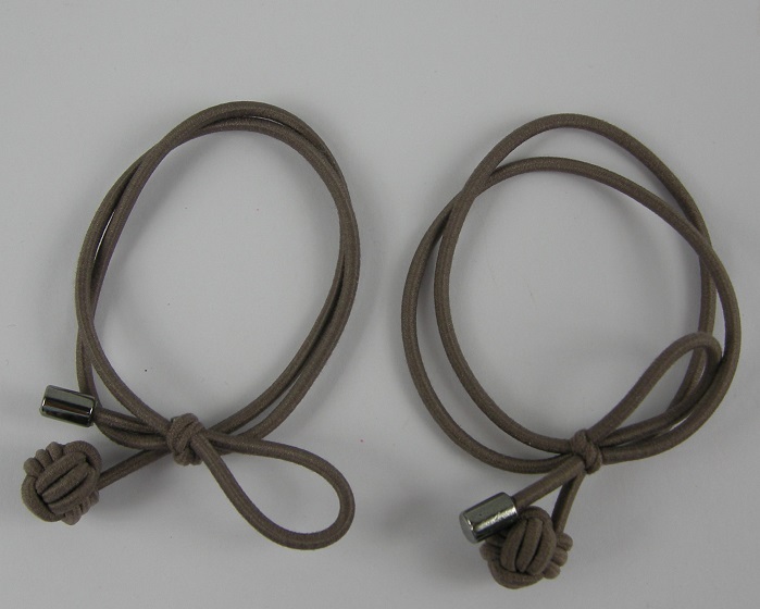 (image for) 2 haarelastieken met knoop.