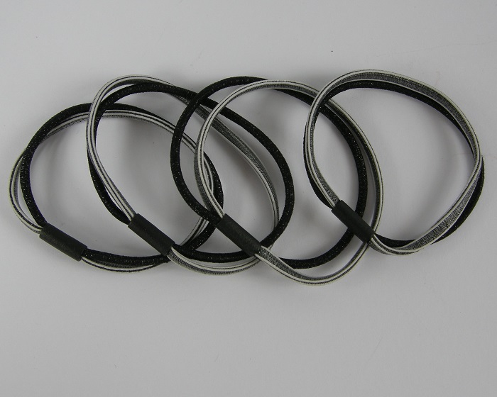 (image for) 8 Haarelastieken zwart/zilver.