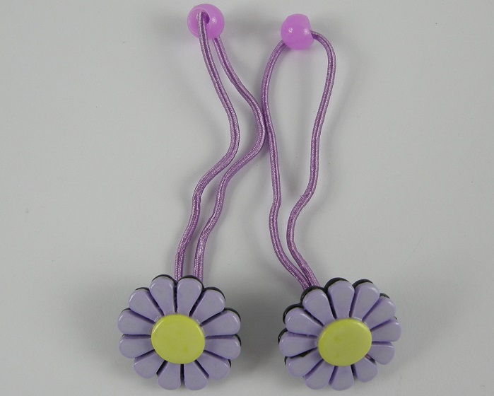 (image for) 2 haarelastieken met bloem paars.