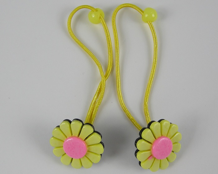 (image for) 2 haarelastieken met bloem geel.
