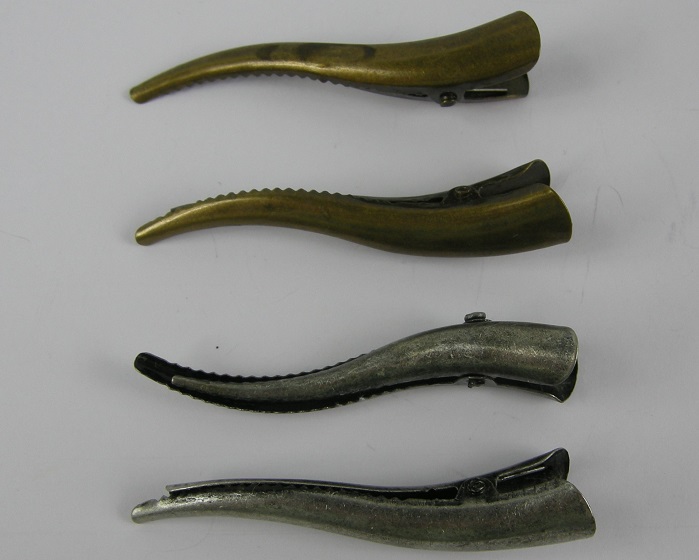 (image for) Duckklem 4 stuks brons/zilver.