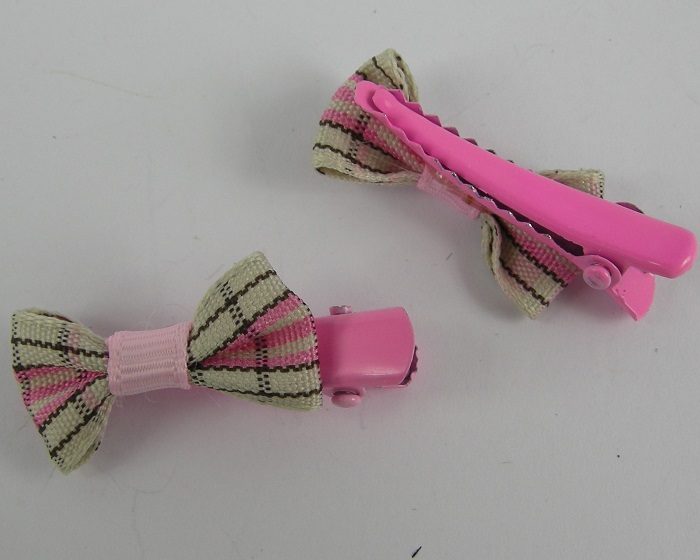 (image for) Duckklemmen met strik roze.
